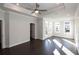 Spacious bedroom with tray ceiling, hardwood floors, and natural light at 280 Briscoe Way # 38, Alpharetta, GA 30009