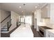 Bright, white kitchen with a large center island and stainless steel appliances at 280 Briscoe Way # 38, Alpharetta, GA 30009