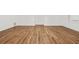 Bright basement area featuring luxury vinyl plank flooring, neutral walls, and a window providing natural light at 110 Glen Eagle Way, Mcdonough, GA 30253