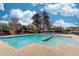 Beautiful community pool with shallow area and covered lounge spot, perfect for relaxation at 1446 Chadwick Ridge Ct, Lawrenceville, GA 30043