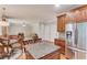 Open kitchen with granite countertops, stainless steel appliances and view of living room at 1446 Chadwick Ridge Ct, Lawrenceville, GA 30043