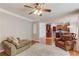 View of living room and dining area, showcasing hardwood floors and an open layout at 1446 Chadwick Ridge Ct, Lawrenceville, GA 30043