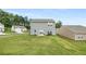 View of a spacious, well-maintained backyard and the rear exterior of the home, offering a great outdoor space at 198 Colbury St, Villa Rica, GA 30180