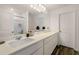 Bathroom featuring a long countertop, modern lighting, and a shower with a shower curtain at 198 Colbury St, Villa Rica, GA 30180