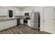 Modern kitchen featuring stainless steel appliances, granite counters, and ample cabinet space at 198 Colbury St, Villa Rica, GA 30180