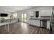 The open kitchen features white cabinets, modern appliances and an easy flow to the living area at 198 Colbury St, Villa Rica, GA 30180