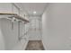 A walk-in closet is complete with wire shelving and ample storage space for organization at 2358 Tilson Rd, Decatur, GA 30032
