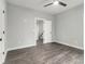 Bright bedroom with ceiling fan and hardwood floors at 490 Third Ave, Scottdale, GA 30079