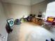 Unfurnished bonus room with neutral walls and carpet, featuring a large window at 15 Emerson Trl, Covington, GA 30016
