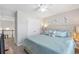 Spacious bedroom features natural light, carpet flooring, and ensuite bathroom access at 1539 School House Run, Dacula, GA 30019