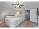 Cozy bedroom with wood floors and white walls, offering a calm and inviting space at 1539 School House Run, Dacula, GA 30019