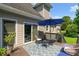 Charming deck with outdoor seating and umbrella, an inviting space for relaxation and enjoying the outdoors at 1539 School House Run, Dacula, GA 30019