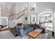 Spacious living room with a staircase and modern finishes throughout at 1539 School House Run, Dacula, GA 30019