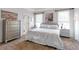 Serene bedroom with soft carpet, white linens, and neutral decor at 1539 School House Run, Dacula, GA 30019