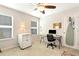 Bright room featuring a ceiling fan, desk, and natural light at 1530 Parkside Village Dr, Cumming, GA 30040