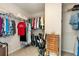 Spacious walk-in closet with ample storage and custom shelving for optimal organization at 1530 Parkside Village Dr, Cumming, GA 30040