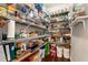 Well-organized pantry with ample shelving for storage at 1530 Parkside Village Dr, Cumming, GA 30040