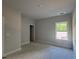 Bright bedroom space with fresh paint, window and trim, ready for finishing touches at 5381 Tuscany Dr, Douglasville, GA 30135