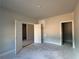 Unfinished bedroom with crisp white doors and neutral walls awaiting personalization at 5381 Tuscany Dr, Douglasville, GA 30135
