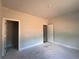 Light-filled bedroom with freshly painted walls and trim, offering a blank canvas at 5381 Tuscany Dr, Douglasville, GA 30135