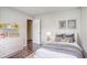Cozy bedroom with a comfortable bed, ample storage, and colorful decor accents at 3604 Cameron Hills Pl, Ellenwood, GA 30294
