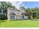 Charming home with a neatly kept front lawn and a convenient two car garage at 3604 Cameron Hills Pl, Ellenwood, GA 30294