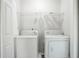 Functional laundry room equipped with a washer and dryer at 3604 Cameron Hills Pl, Ellenwood, GA 30294