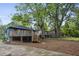 Backyard featuring a wooden deck surrounded by mature trees at 531 Atlanta Se Ave, Atlanta, GA 30315