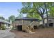 Backyard featuring an elevated wooden deck with stairs at 531 Atlanta Se Ave, Atlanta, GA 30315