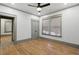Neutral bedroom features hardwood flooring, with a nearby closet and natural light at 531 Atlanta Se Ave, Atlanta, GA 30315