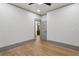 Empty bedroom featuring hardwood flooring, gray trim, and neutral walls at 531 Atlanta Se Ave, Atlanta, GA 30315