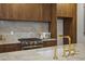 Close up shot of the kitchen with quartz countertops and stainless steel appliances at 531 Atlanta Se Ave, Atlanta, GA 30315