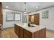 Open kitchen with an island, wood cabinets, and stainless steel appliances at 531 Atlanta Se Ave, Atlanta, GA 30315