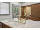 Beautiful kitchen island with a marble counter top and a gold faucet at 531 Atlanta Se Ave, Atlanta, GA 30315