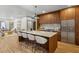 Open kitchen with a large island, stainless steel appliances, and wooden cabinetry at 531 Atlanta Se Ave, Atlanta, GA 30315