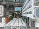 High-rise buildings with a pool and landscaping in a birds-eye view at 199 14Th Ne St # 3003, Atlanta, GA 30309