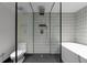 Modern bathroom with a glass-enclosed shower, toilet, and soaking tub, all designed with contemporary fixtures at 199 14Th Ne St # 3003, Atlanta, GA 30309