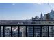 Enjoy this city view from your balcony with nearby buildings filling the skyline on a bright, sunny day at 199 14Th Ne St # 3003, Atlanta, GA 30309