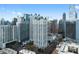A cityscape with multiple towers in midtown and a pool in between at 199 14Th Ne St # 3003, Atlanta, GA 30309