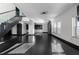Bright, open living space with dark floors, modern staircase, and large windows at 199 14Th Ne St # 3003, Atlanta, GA 30309