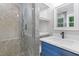 This bathroom features a glass shower, modern vanity, and a clean, updated design at 1164 Red Oak Cv, Tucker, GA 30084