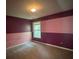 Bedroom with a two-tone paint scheme and natural light from a window at 3324 Whitmore Ct, Acworth, GA 30101