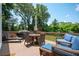 Back deck offers outdoor seating, a barbecue, and a relaxing place to spend time outside at 2251 Rushmore Dr, Marietta, GA 30062