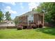 Spacious backyard featuring a deck and a lush lawn, perfect for outdoor activities and relaxation at 2251 Rushmore Dr, Marietta, GA 30062