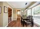 Dining area with a table set near the bay window allowing natural light to pour in at 2251 Rushmore Dr, Marietta, GA 30062