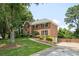 Charming two-story brick home with manicured lawn and landscaping at 2251 Rushmore Dr, Marietta, GA 30062