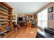 Home office with ample shelving, natural light, and hardwood floors, perfect for remote work at 2251 Rushmore Dr, Marietta, GA 30062