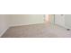 Bedroom features neutral walls, carpet and an open door to the rest of the house at 914 Hemingway Rd, Stone Mountain, GA 30088