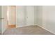Neutral bedroom features plush carpet, a closet and ample natural light at 914 Hemingway Rd, Stone Mountain, GA 30088