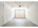 Garage featuring a garage door and walls ready to be used and customized at 914 Hemingway Rd, Stone Mountain, GA 30088